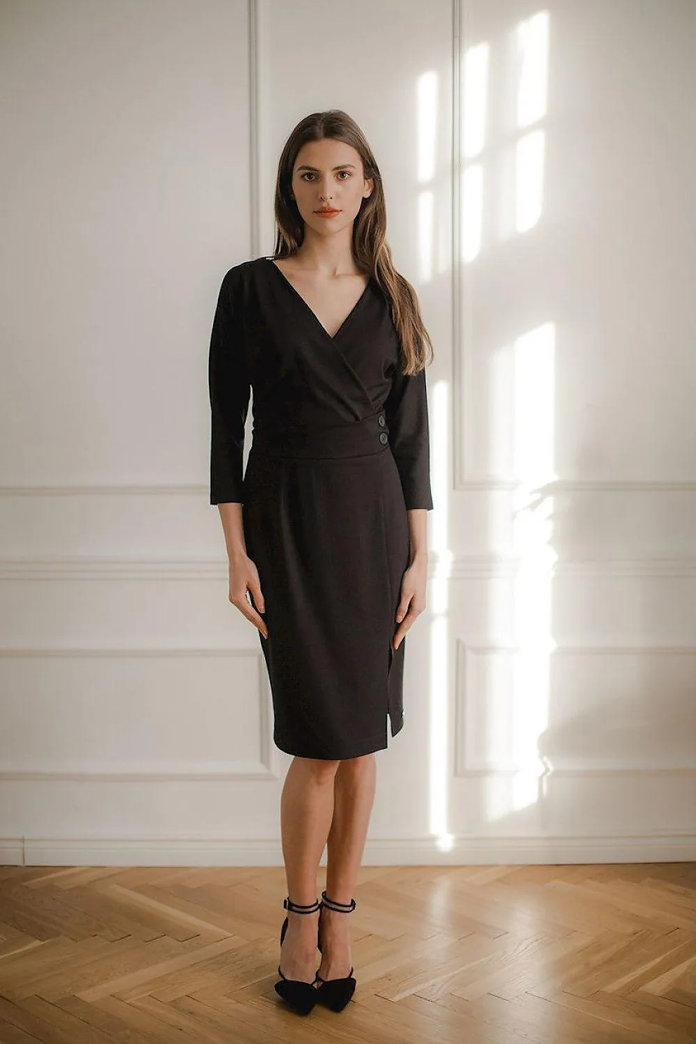 Elegant Black Midi Dress with Kimono Sleeves and Playful Front Slit